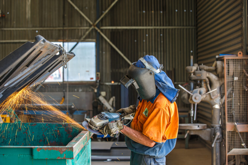 Repairing waste bin at KS Environmental
